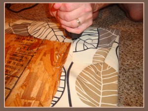 staple the corners Staple the corners of the fabric